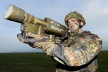 The head of Germany's ruling party called on the industry to increase the pace of weapons production